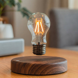 Bordlampe med svevende lyspære på rund fot i trekompositt, Mørkt tre og klar