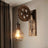 Retro vegglampe med trinse og metallbur i industristil, Antikk bronse