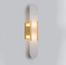 Vegglampe i marmor med oval form og metallramme, Gull