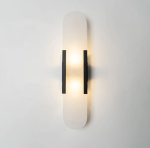 Vegglampe i marmor med oval form og metallramme, Svart