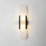 Vegglampe i marmor med oval form og metallramme, Svart